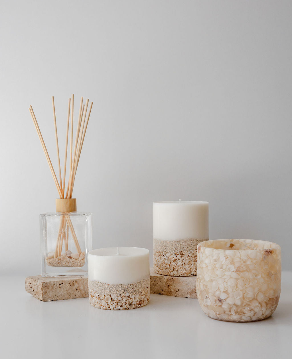 Handcrafted Shark Bay shell candle, shell diffuser and shell lantern collection made with natural Shark Bay shells